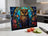 Cutting board with a stained-glass owl and floral motif.