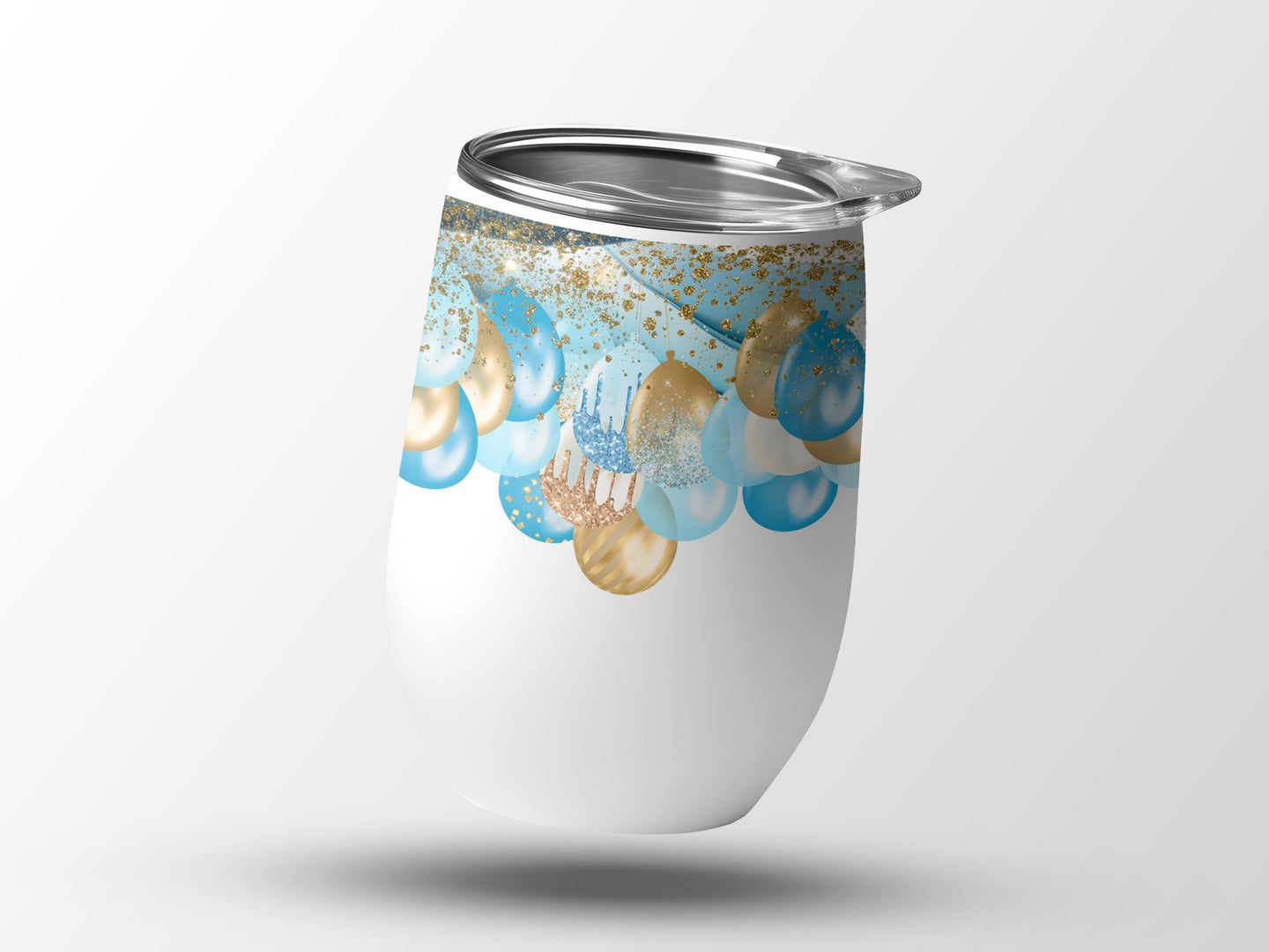 White tumbler with gold and blue glitter balloon design and silver lid.