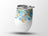 White tumbler with gold and blue glitter balloon design and silver lid.
