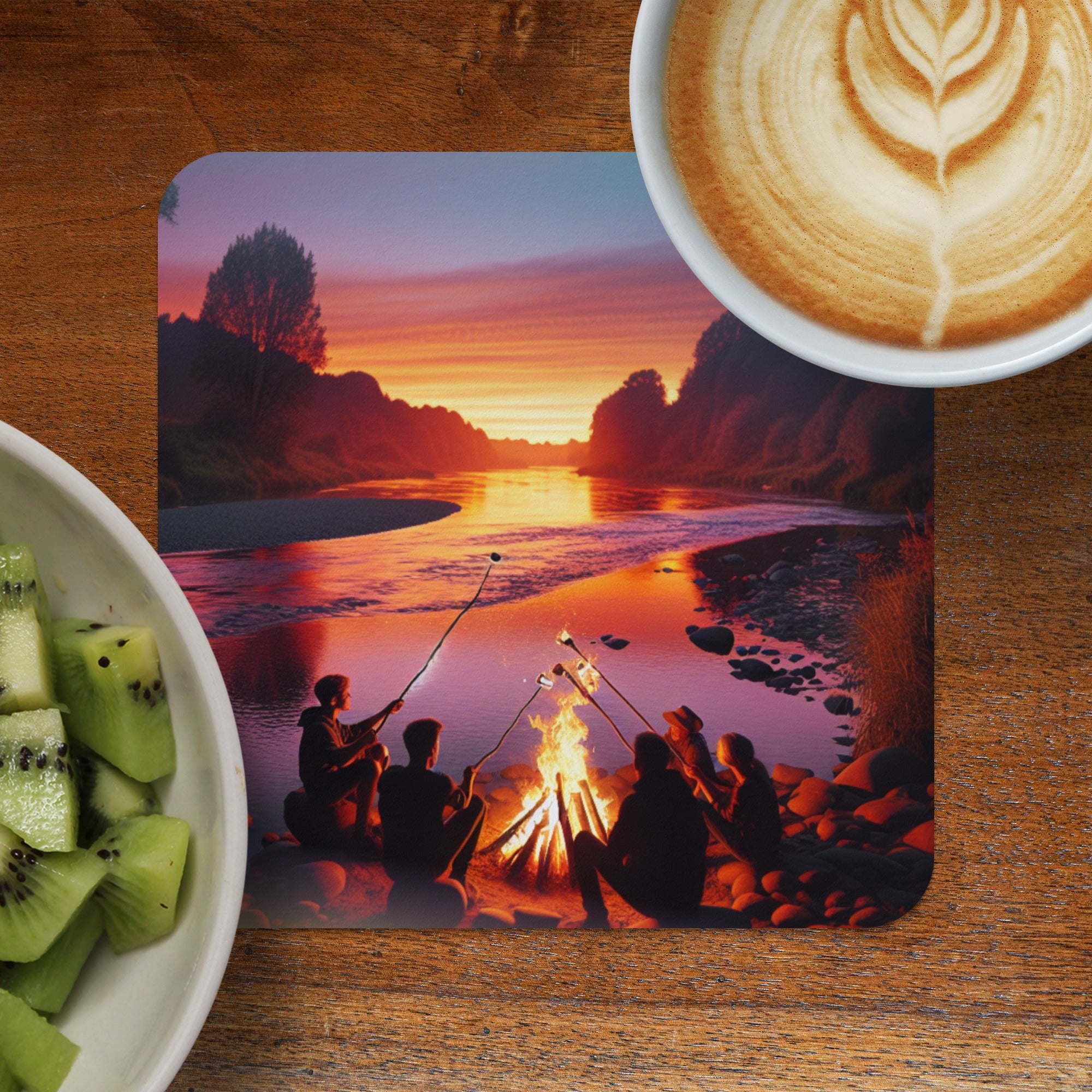 Campfire scene on a placemat next to coffee and kiwi.