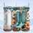 Teal cowboy boots with flowers and leopard print on a tumbler.