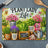 Cutting board with "Plant Lady Life" text and various potted plants.