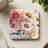Coaster with flowers and ladybug, reading "I AM CAPABLE OF amazing things".