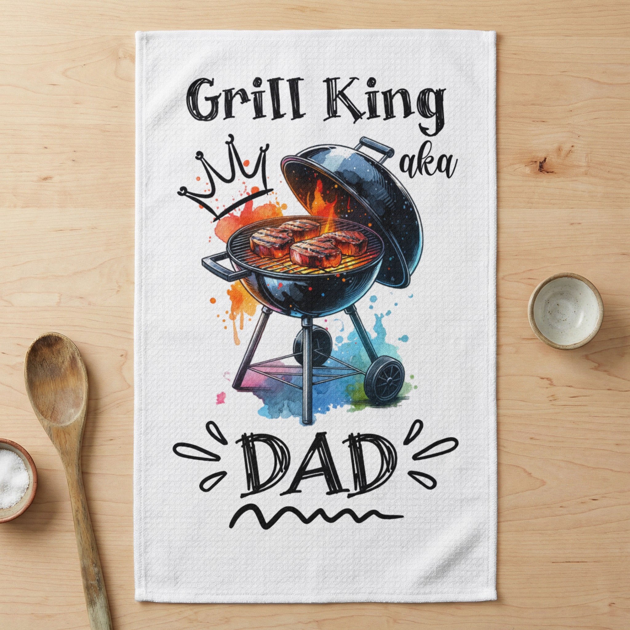 Grill King aka Dad graphic with steaks on a grill.