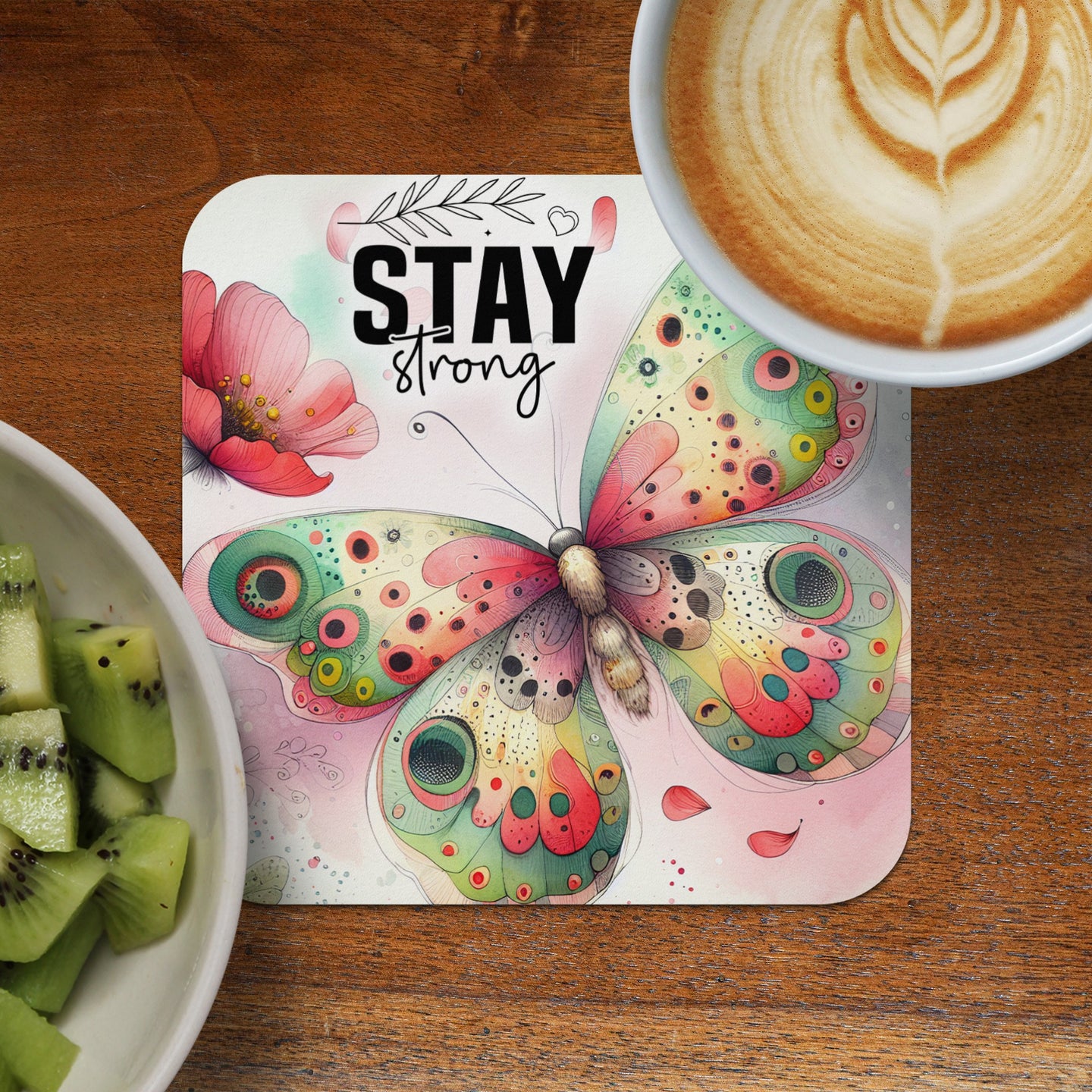 Butterfly design with "Stay Strong" text and floral accents on a coaster.