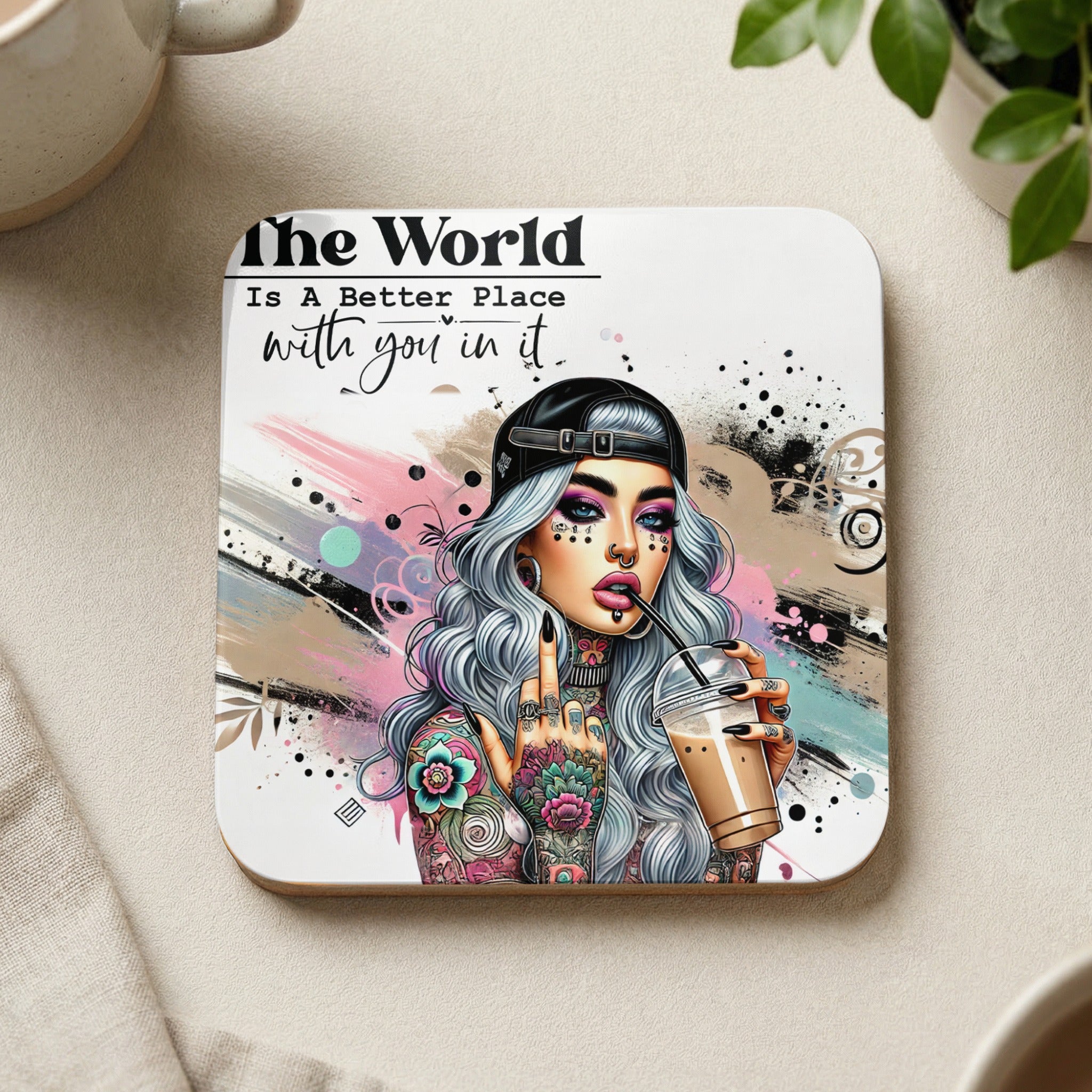 Woman with tattoos and piercings drinks from a cup, text reads "The World is a Better Place with you in it".