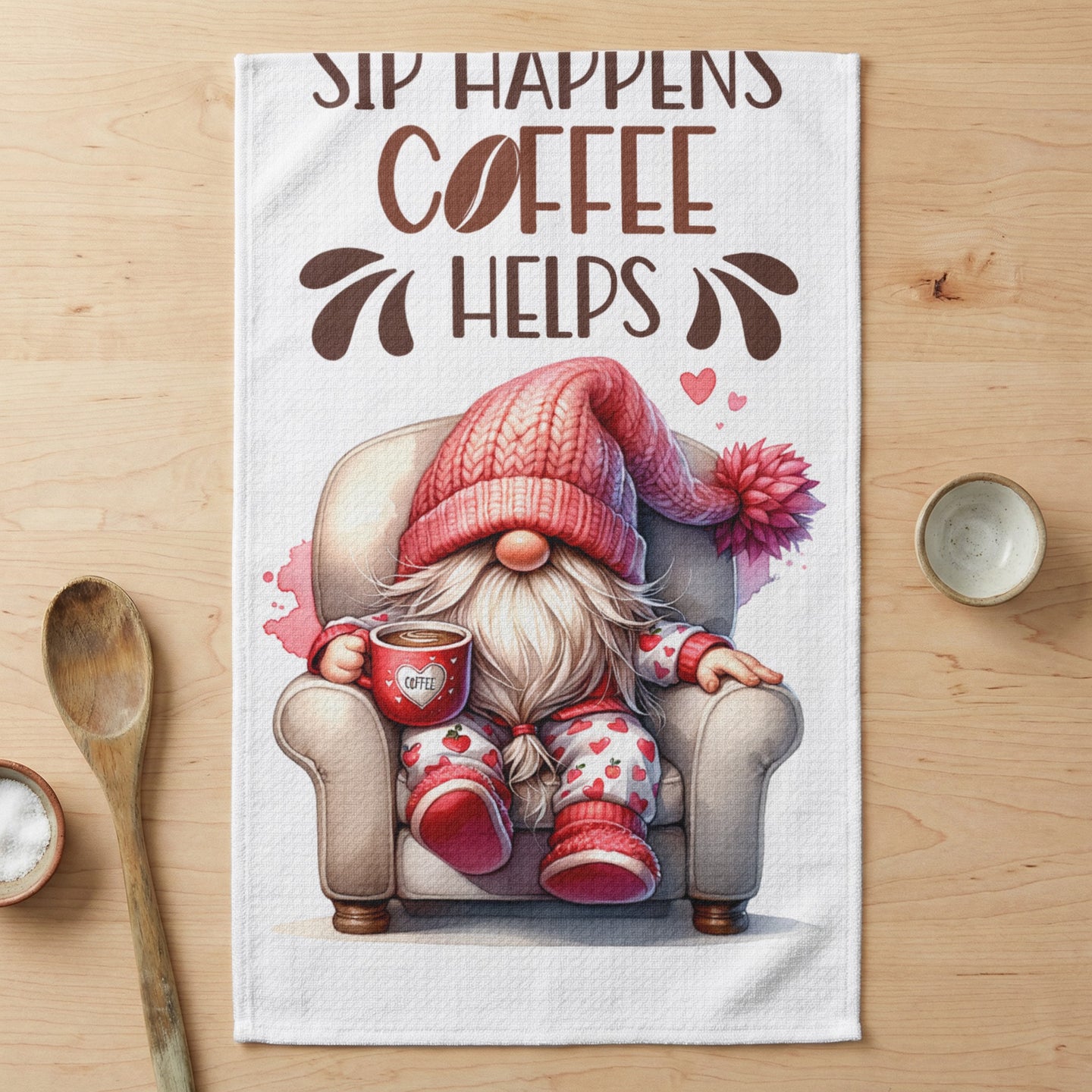 Gnome in armchair with coffee, text "Sip Happens Coffee Helps".
