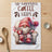 Gnome in armchair with coffee, text "Sip Happens Coffee Helps".