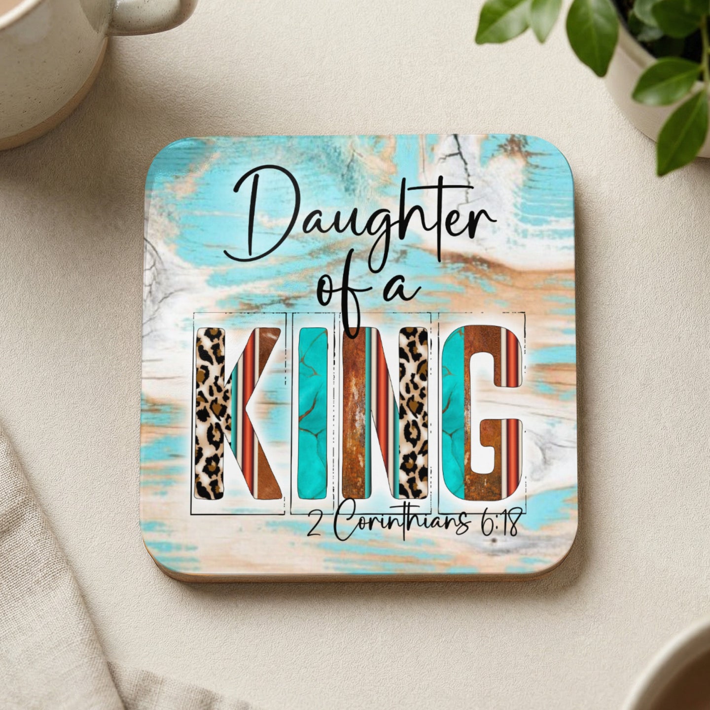 Coaster with "Daughter of a King" text and 2 Corinthians 6:18.