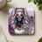 Woman with skull bandana mask and purple hair, "WHO RUNS THE WORLD?"