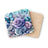Blue butterflies and purple roses on round coasters.