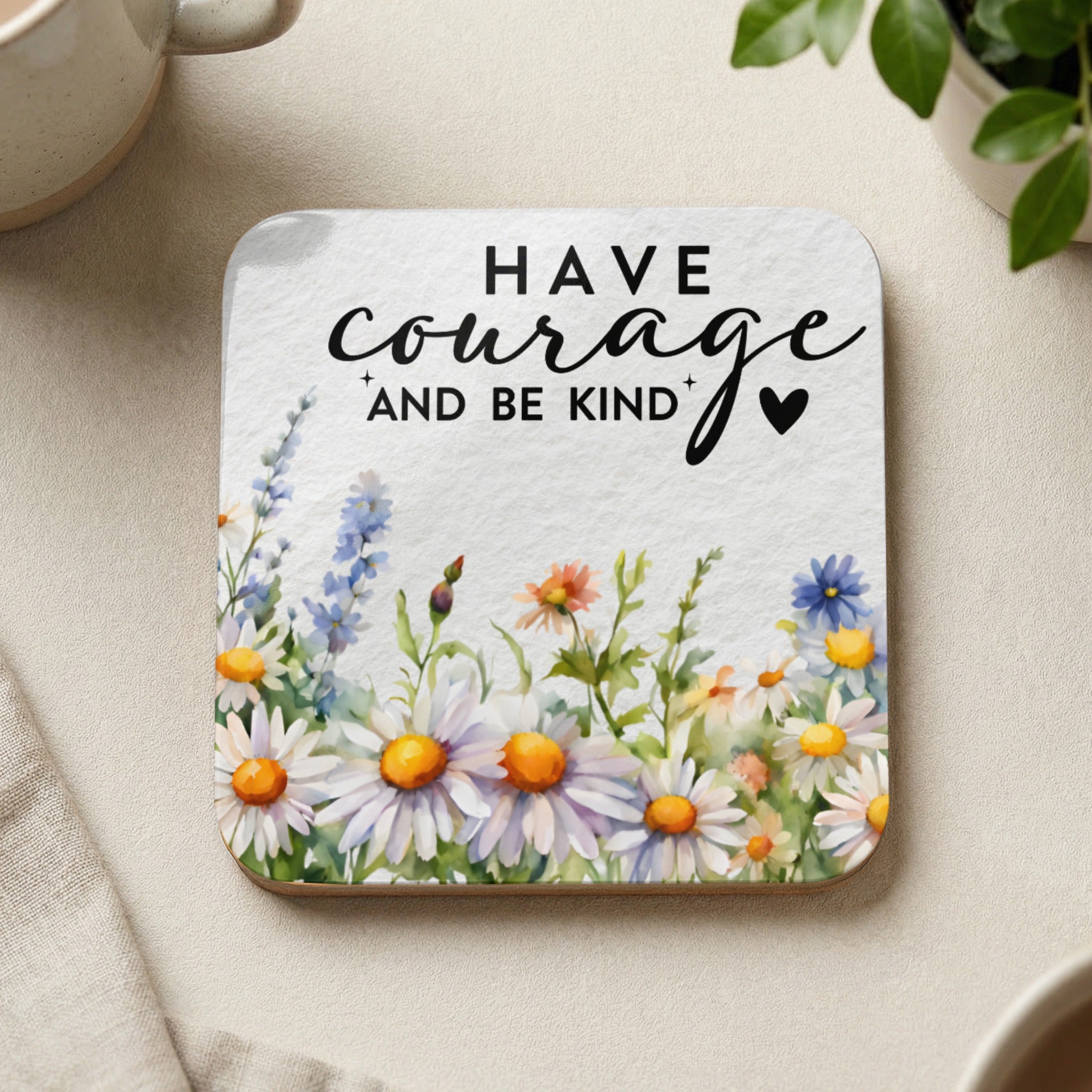 Square coaster with "Have Courage and Be Kind" text and floral daisies and lavender border.