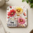 Square coaster with colorful daisies and "Be the Sunshine" text.
