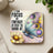 Coaster with inspirational quote and colorful butterfly on a daisy.