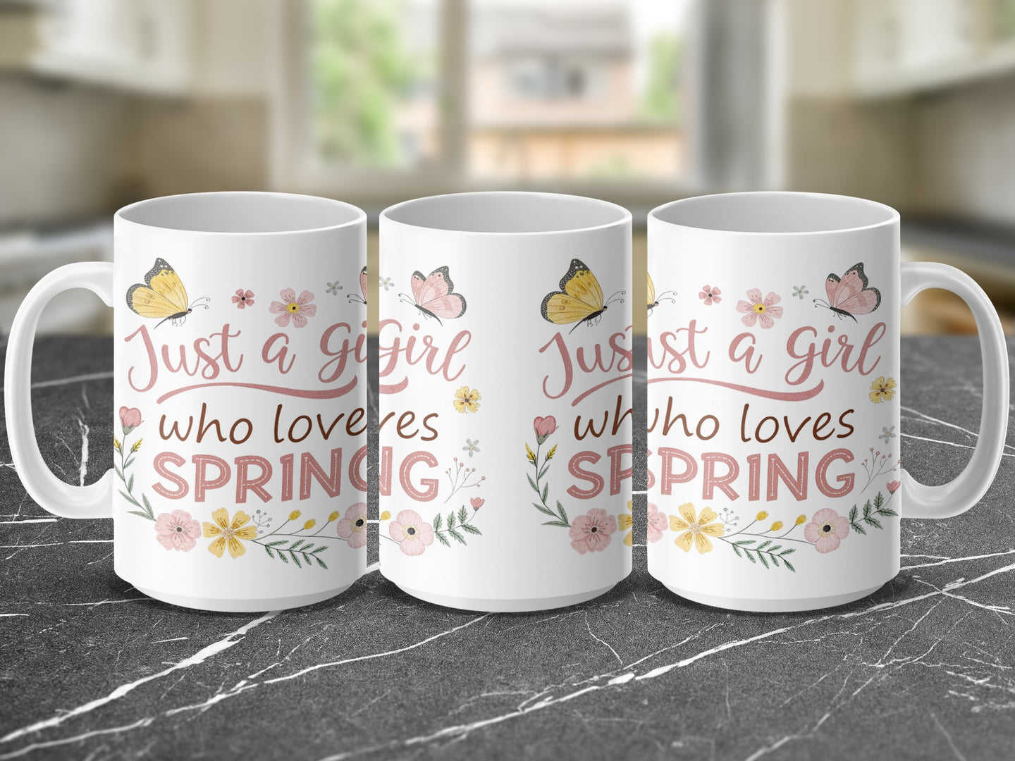 Three white mugs with "Just a girl who loves spring" text and floral accents.