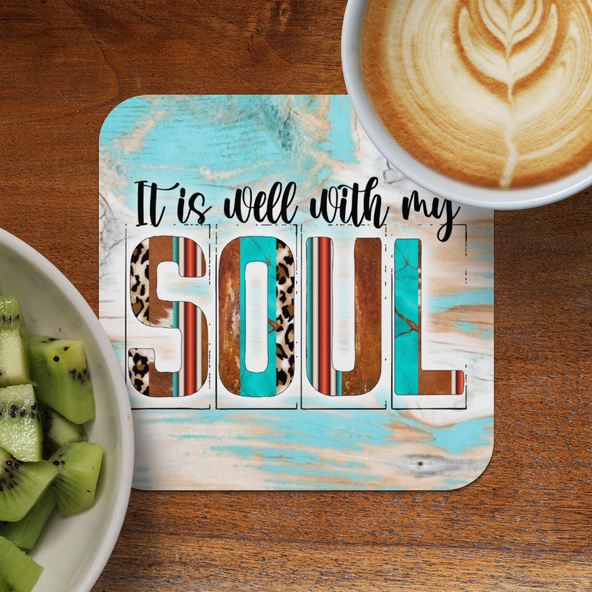 It is well with my SOUL text on a rustic wooden background with coffee and kiwi.