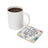 White mug of coffee next to a coaster with "I am ready to allow miracles into my life" text.