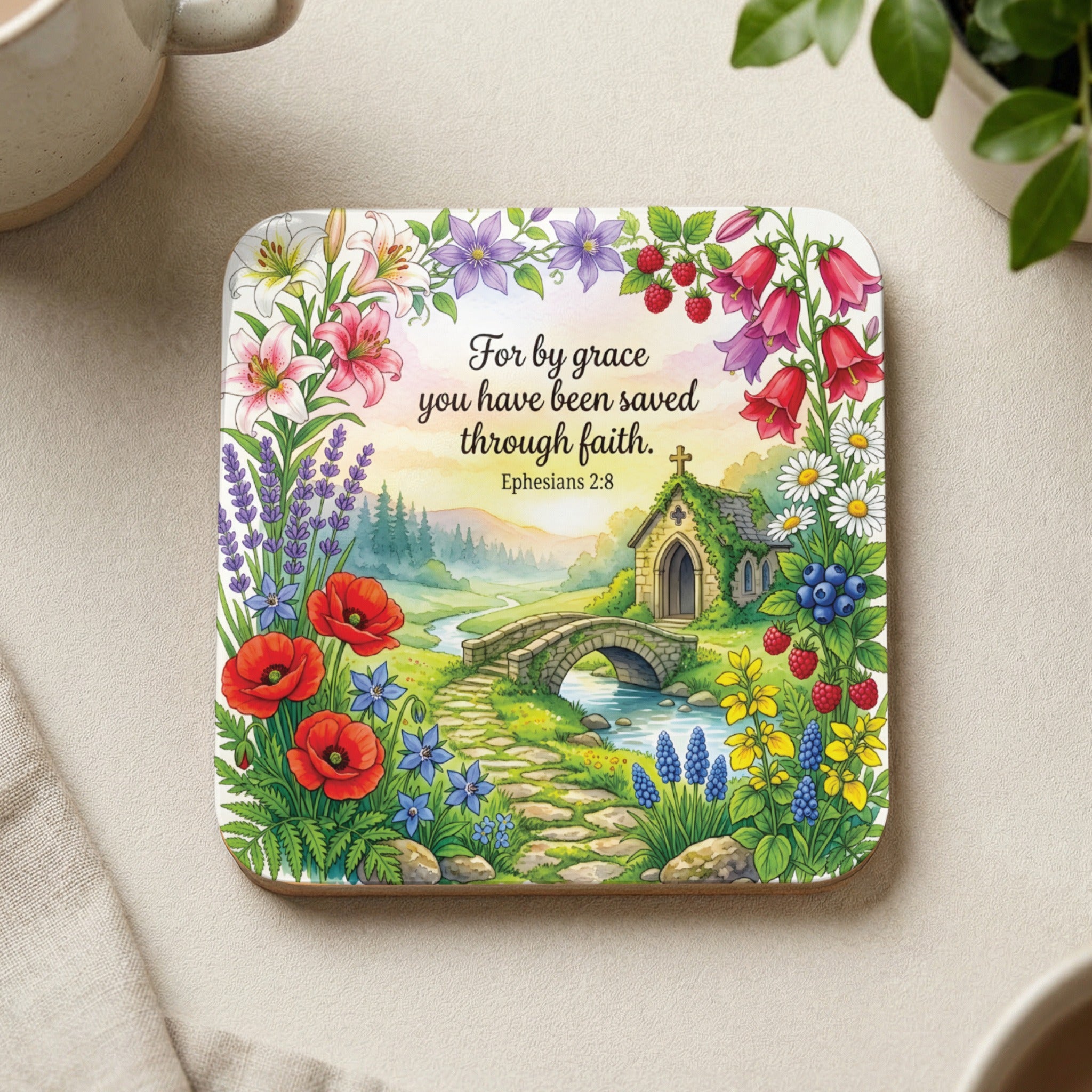Coaster with a floral landscape and Bible verse "For by grace you have been saved through faith. Ephesians 2:8".