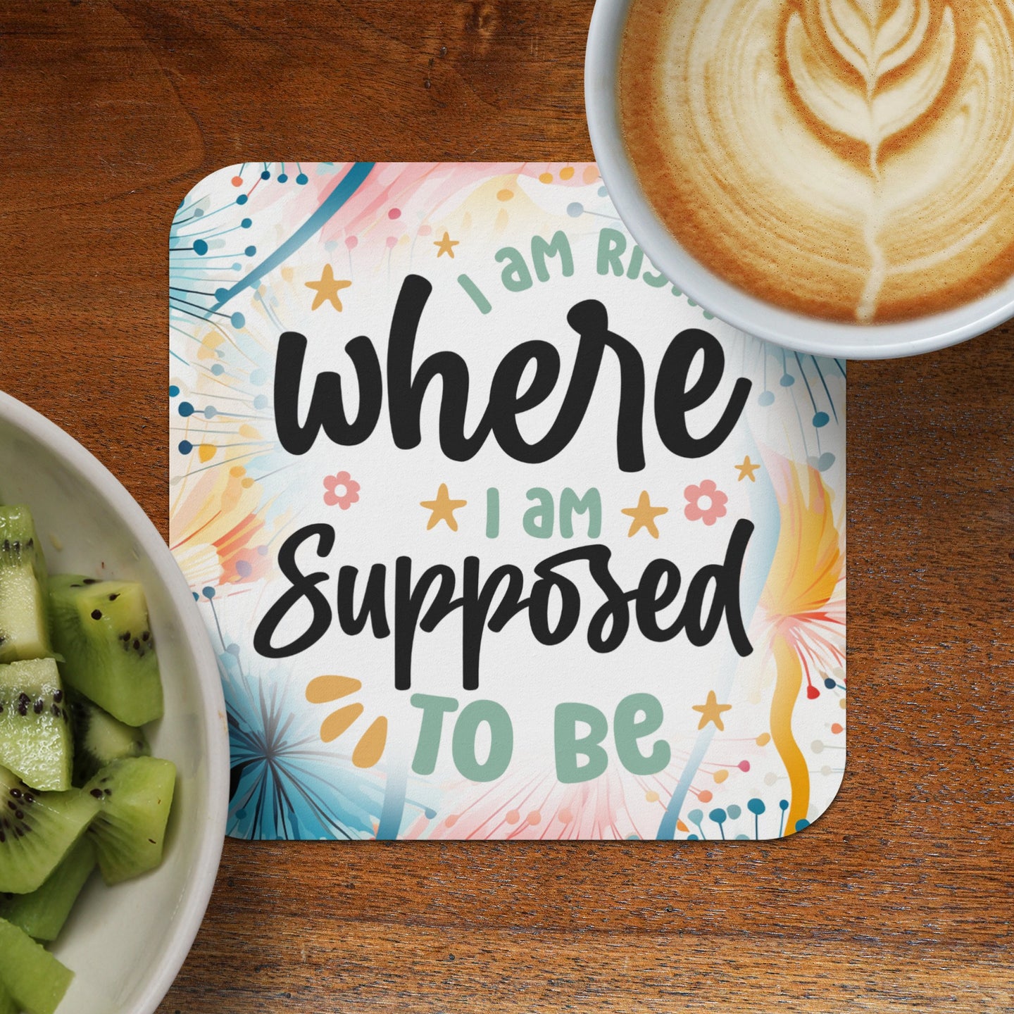 Coaster with "I am where I am supposed to be" text and floral design.