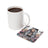 Coaster with tattooed woman and text "EVERYONE ELSE IS Already Taken" next to mug.