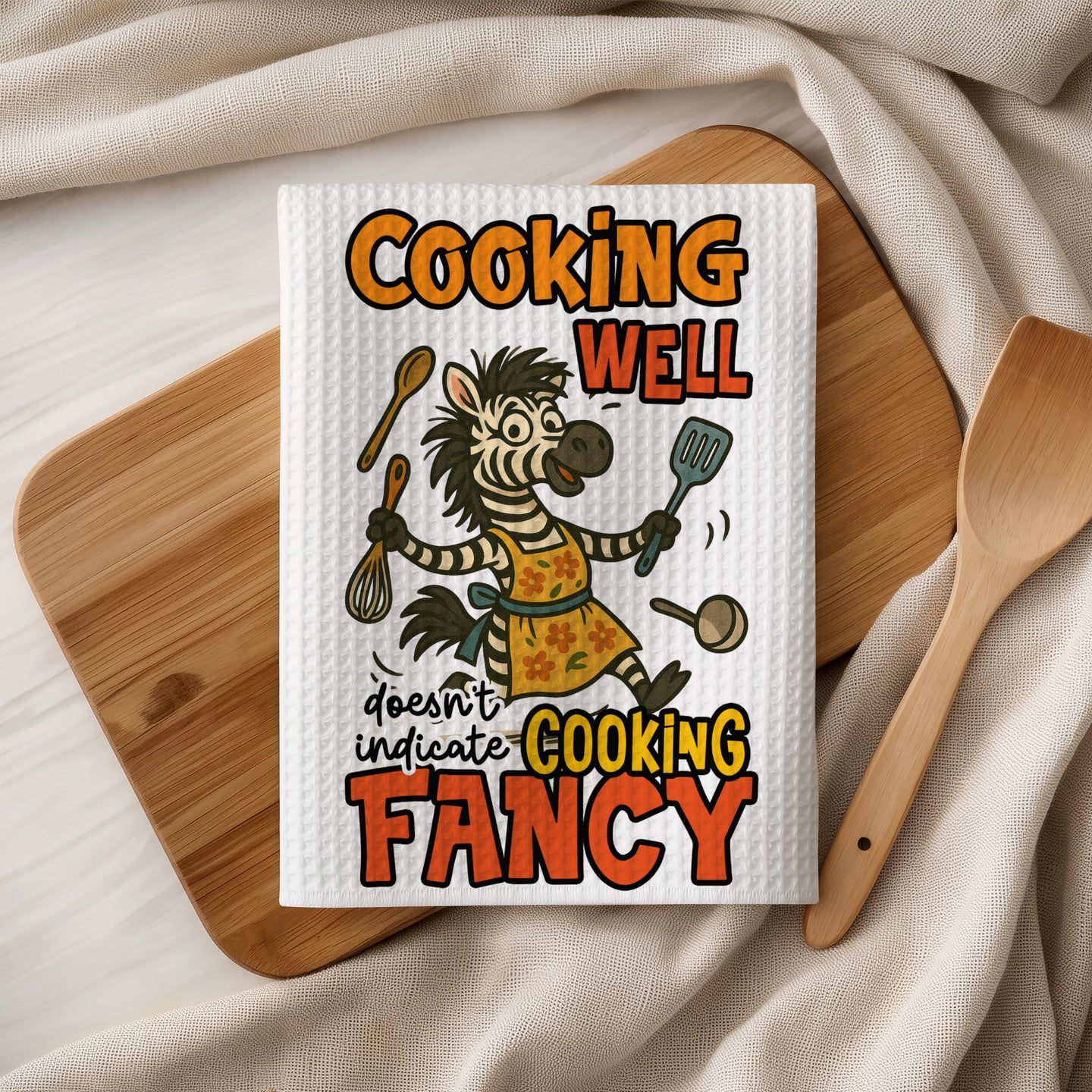 Cartoon zebra with kitchen utensils, text "Cooking well doesn't indicate cooking fancy".