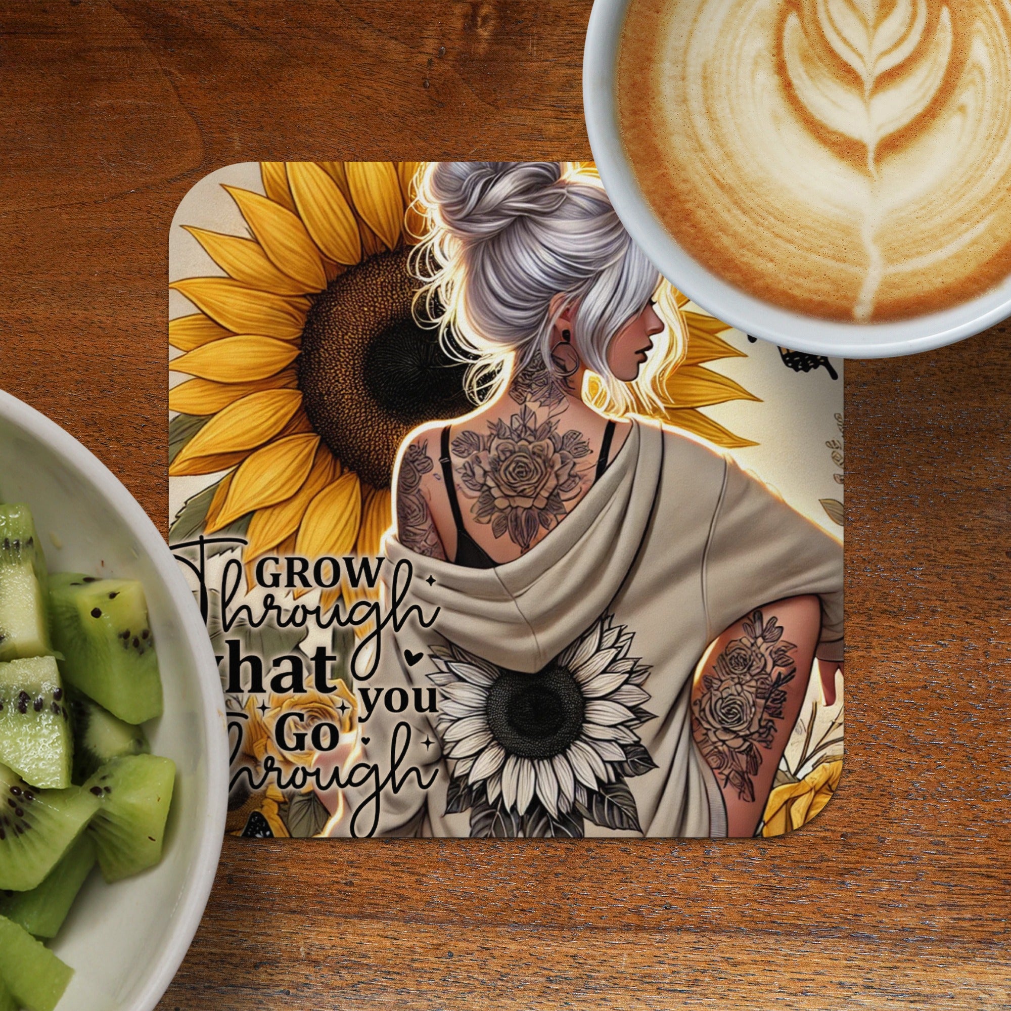 Woman with tattoos and sunflowers, "Grow through what you go through" quote.
