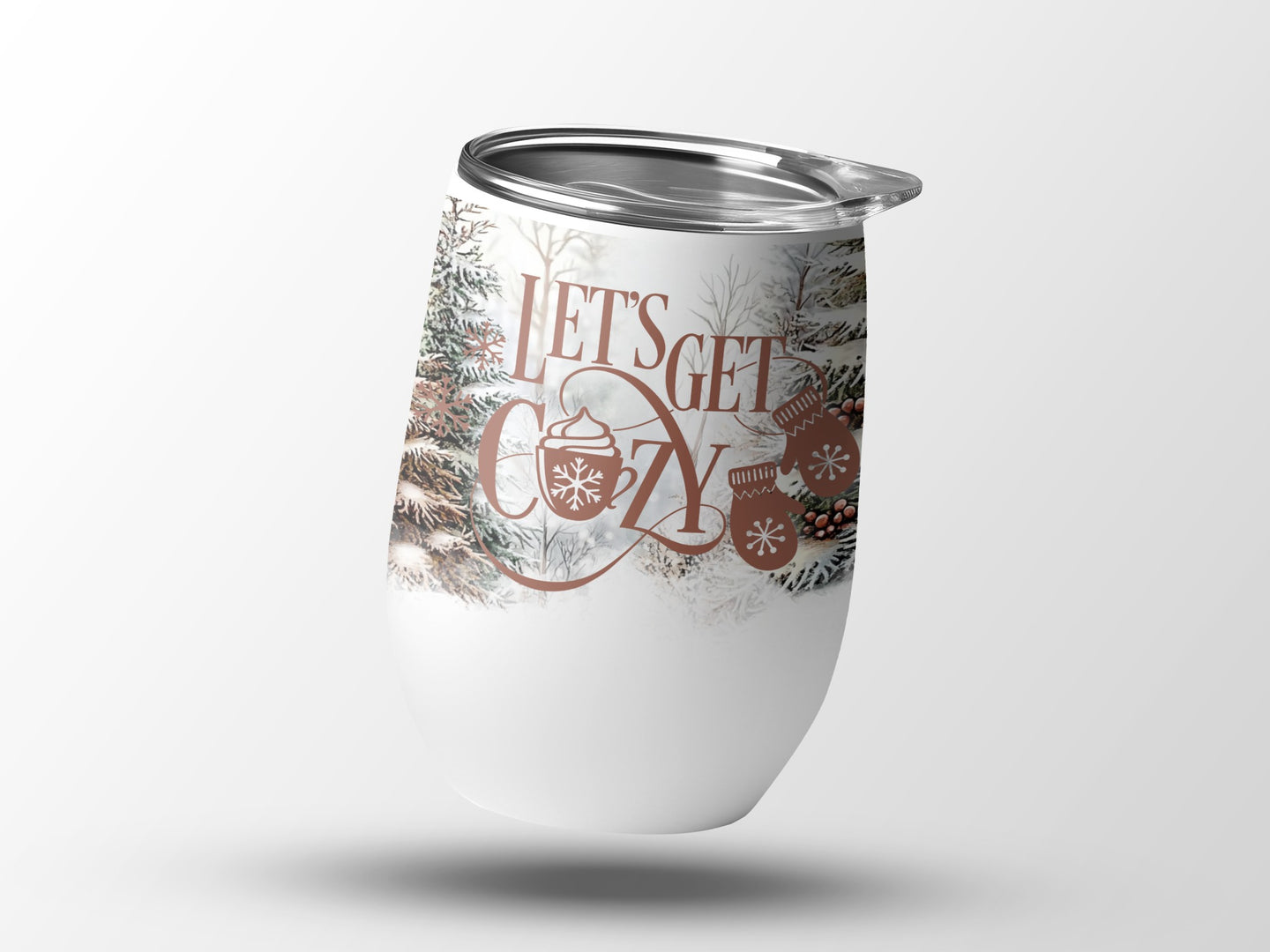 White tumbler with "Let's Get Cozy" and winter imagery.