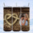 Heart-shaped rope on wooden background with couple in photo frame.
