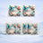 Happy Birthday mug with butterflies and floral wreath decoration.