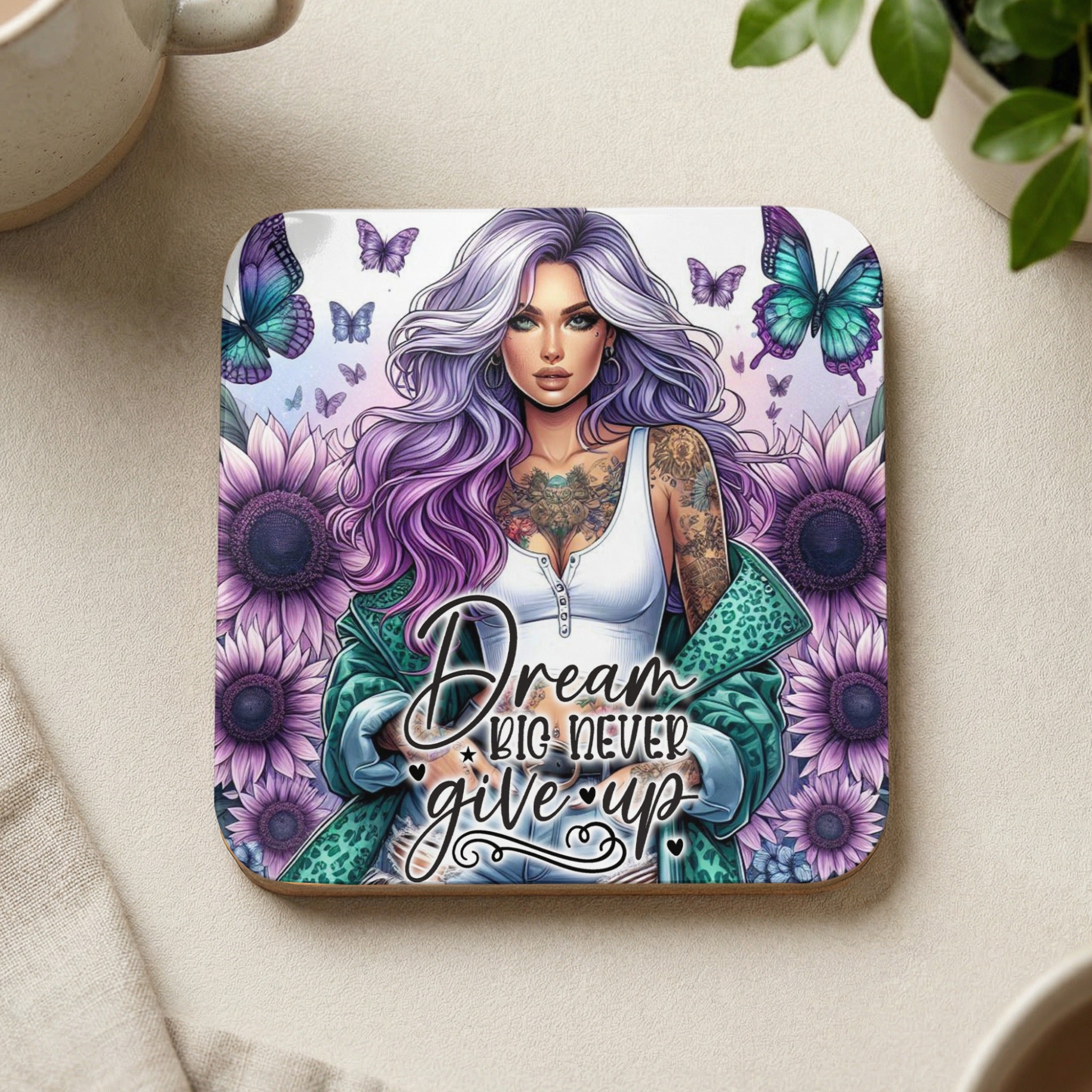 Woman with purple hair and tattoos, surrounded by sunflowers and butterflies, text reads "Dream Big Never Give Up".