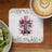 Cross with text "JESUS LOVES ME, THIS I KNOW" surrounded by floral pattern.