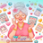 Smiling older woman in glasses with bingo cards and markers.