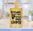 Bamboo cutting board with "Kitchen the heart of the Home" text.