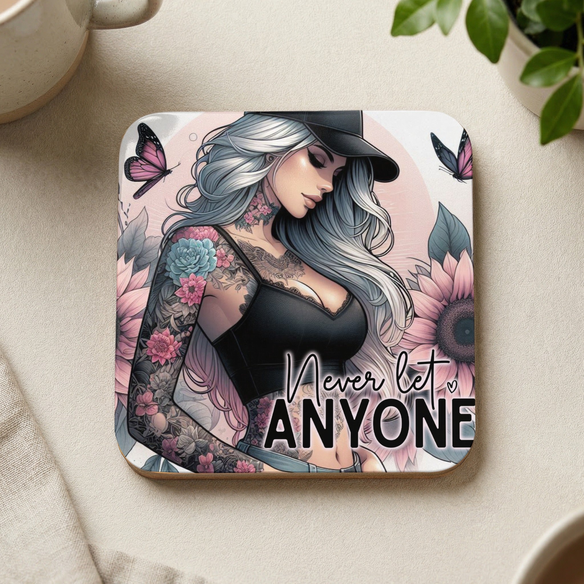 Woman with tattoos and butterfly motif, text "Never Let Anyone".