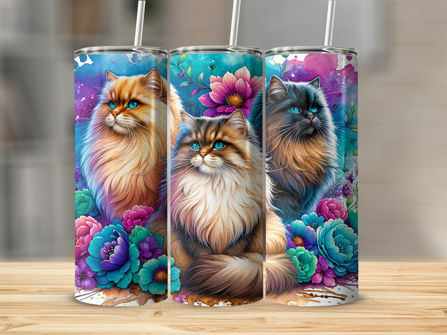 Three tumblers featuring majestic cats with blue and purple floral accents.