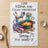 Kitchen towel with casserole and utensils, text "The kitchen was clean yesterday. Sorry you missed it."