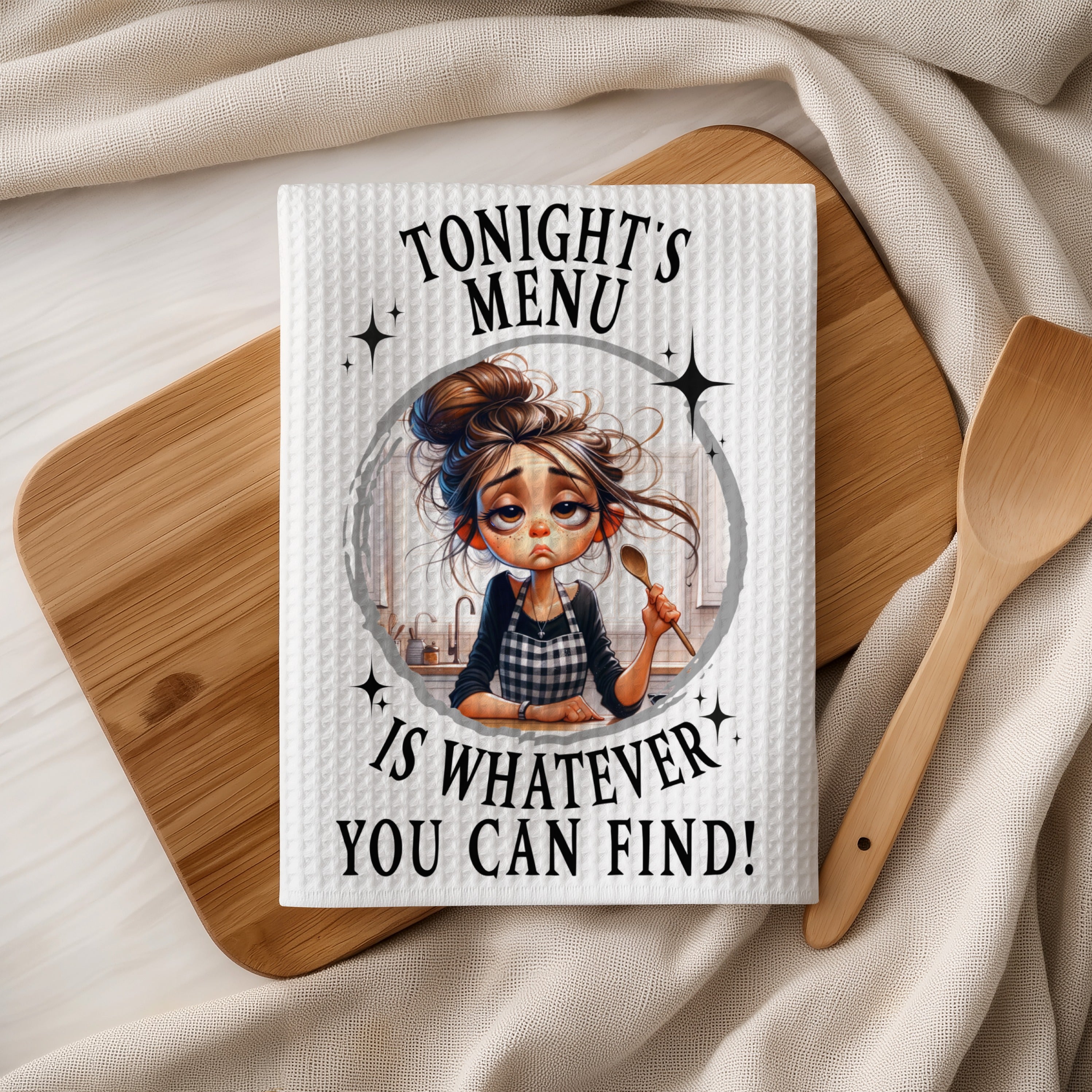 Towel with cartoon illustration and text "TONIGHT'S MENU IS WHATEVER YOU CAN FIND!".