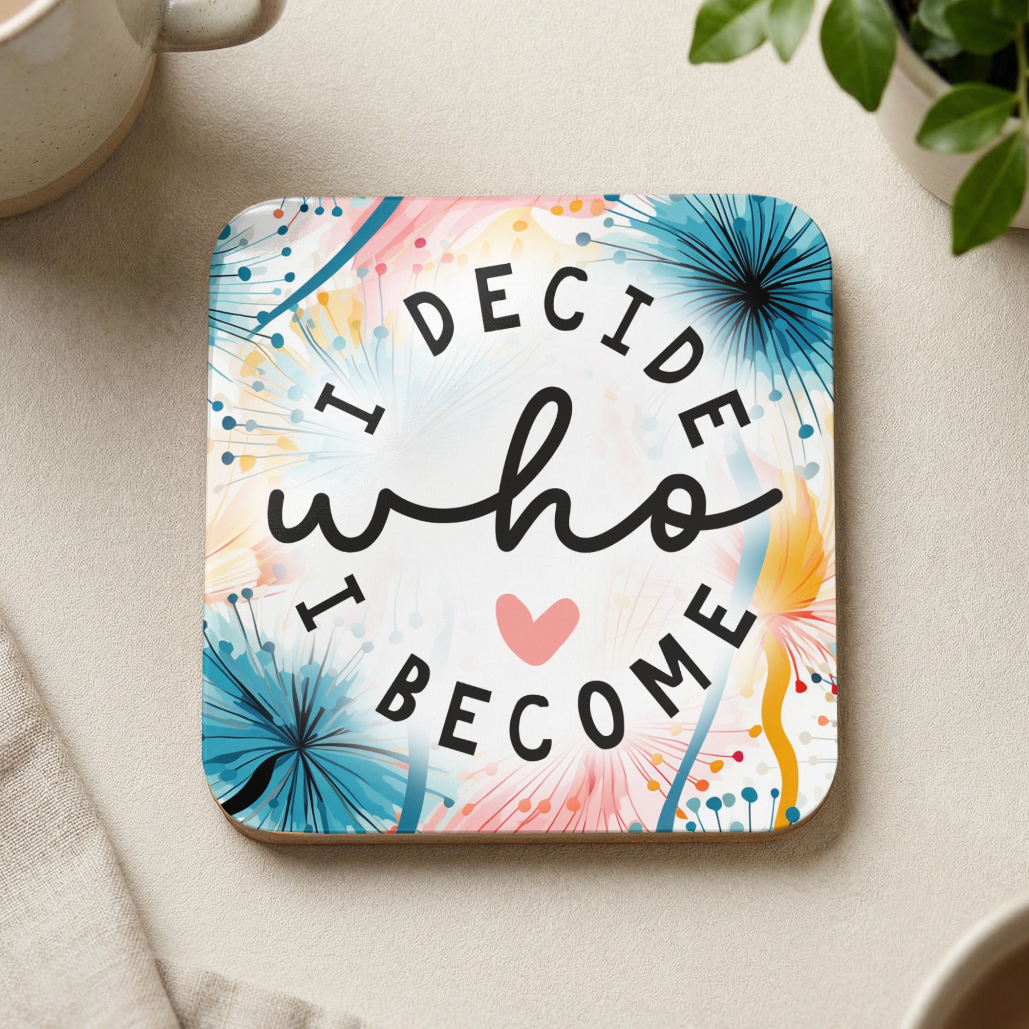 Coaster with colorful floral design and text "I DECIDE who I BECOME".