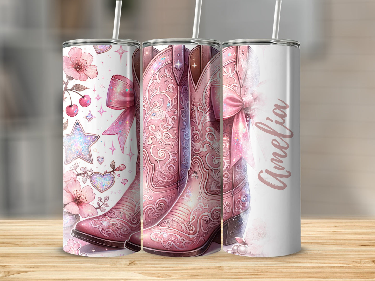 Pink cowboy boots with flowers and stars on tumblers.