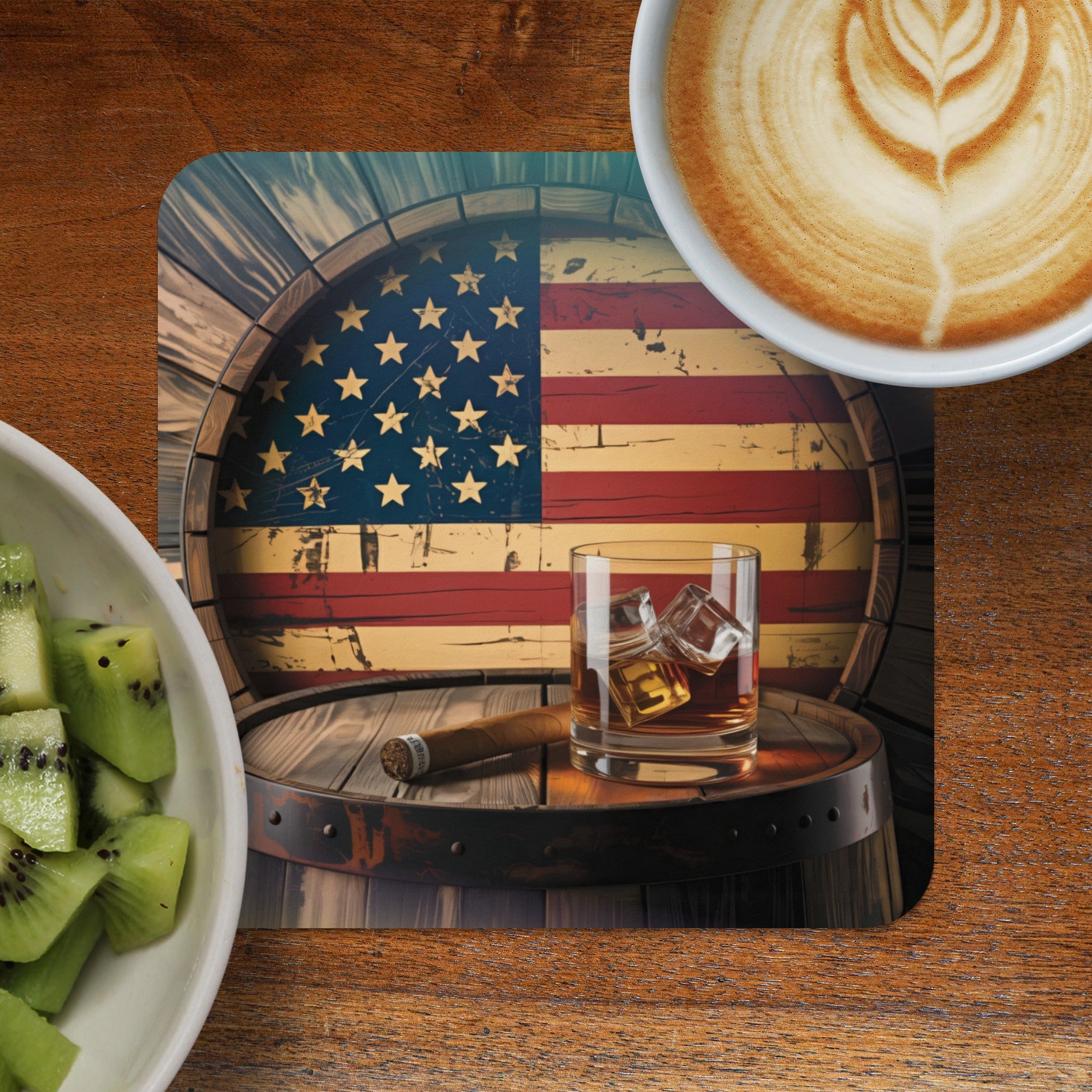 Coaster with American flag, whiskey glass, cigar, and latte art.