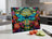 Glass cutting board with a stained-glass dragonfly and floral design.