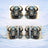 Steampunk buffalo head design on a white mug, repeated four times.