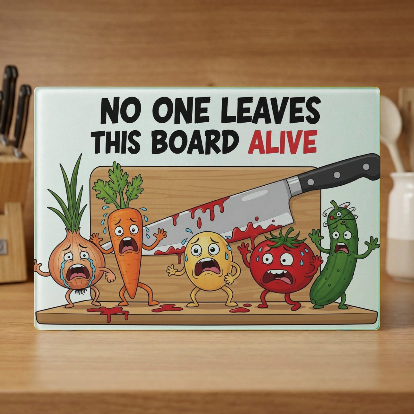 Humorous cutting board with cartoon vegetables and knife, reads "NO ONE LEAVES THIS BOARD ALIVE."