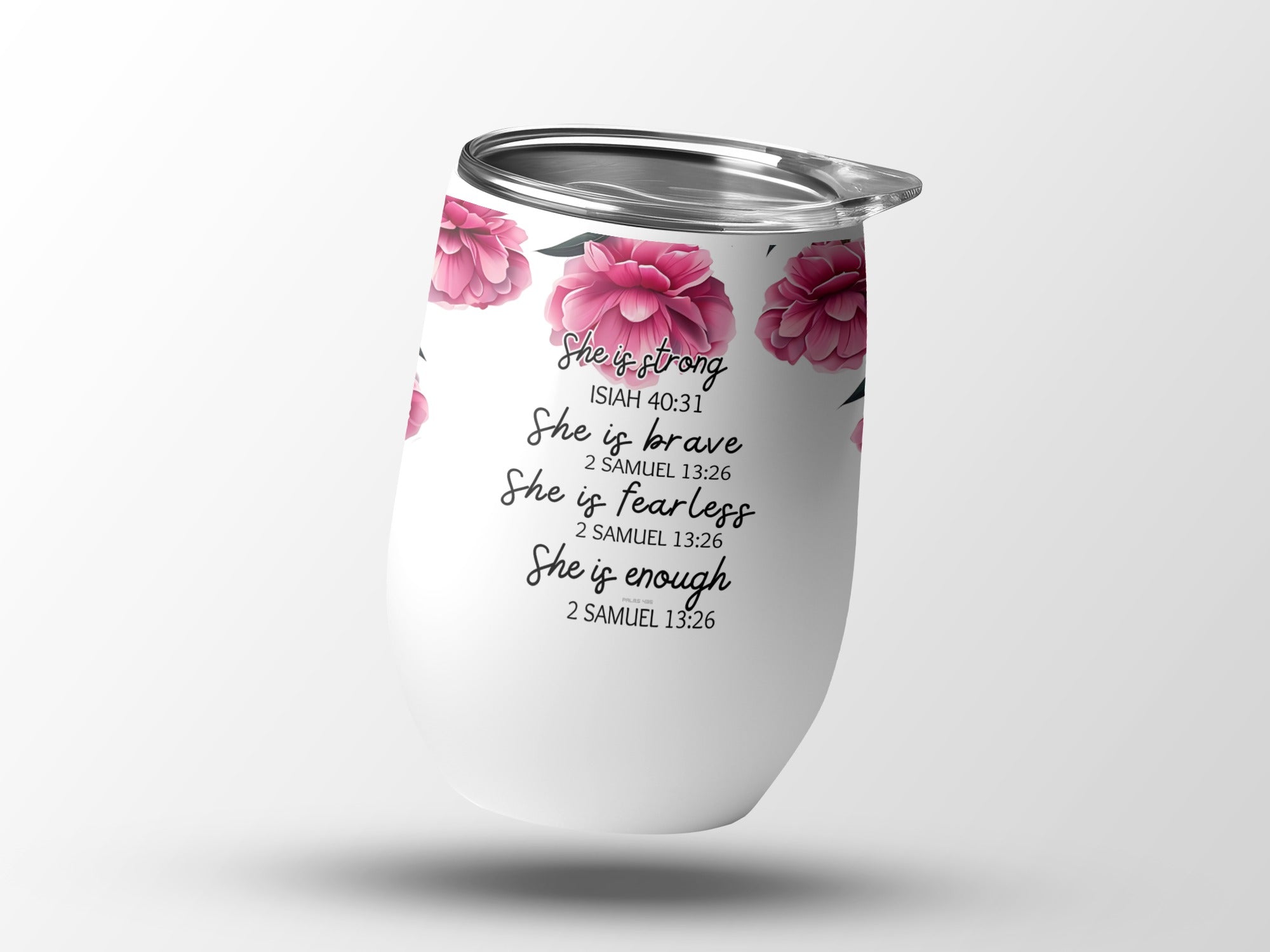 White tumbler with floral accents and uplifting Bible verses.