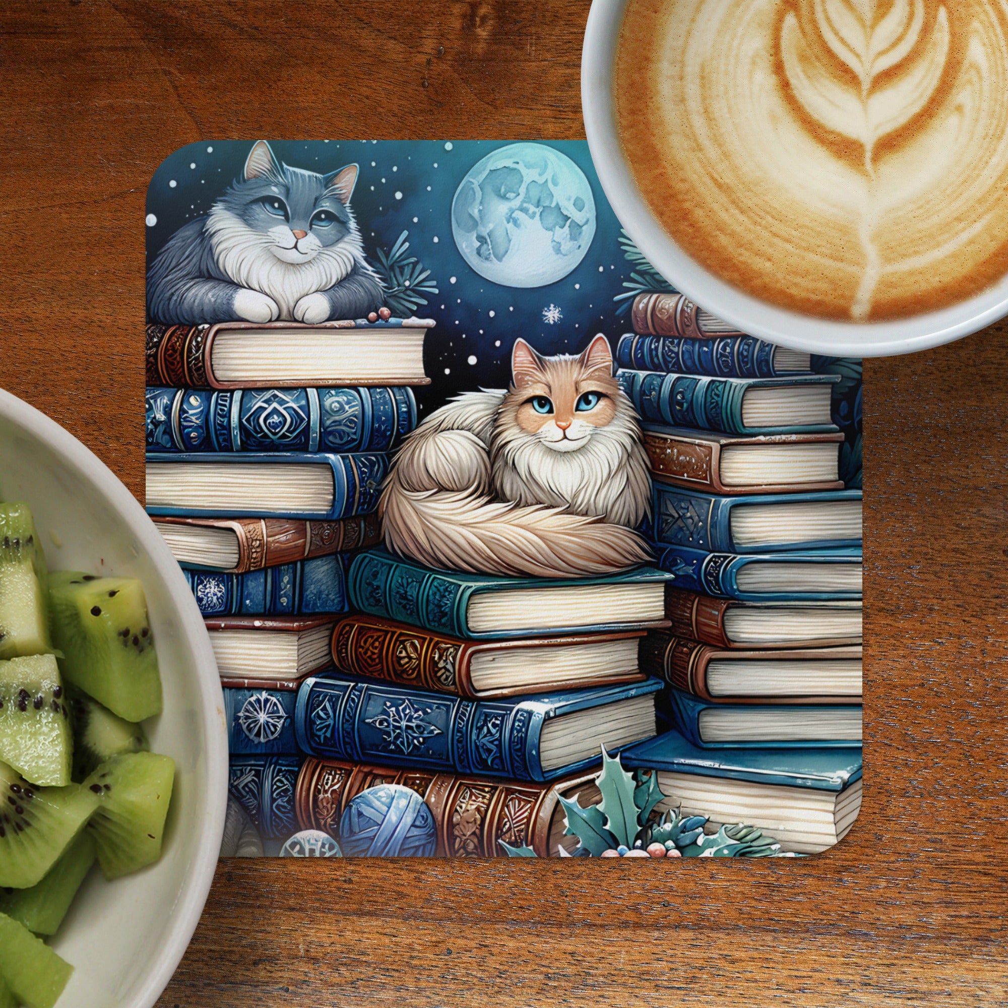 Two cats sit on a stack of old books with a full moon in the background.