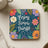 Coaster with "Enjoy Simple Things" text and colorful floral design.