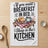 Towel with "If you want breakfast in bed, sleep in the kitchen" text.
