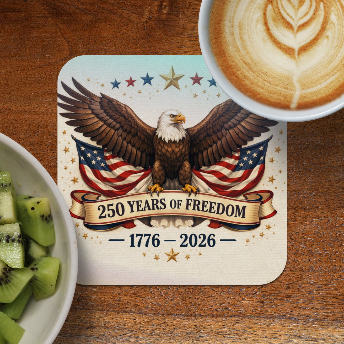 Eagle with American flag and "250 Years of Freedom" text on a coaster.