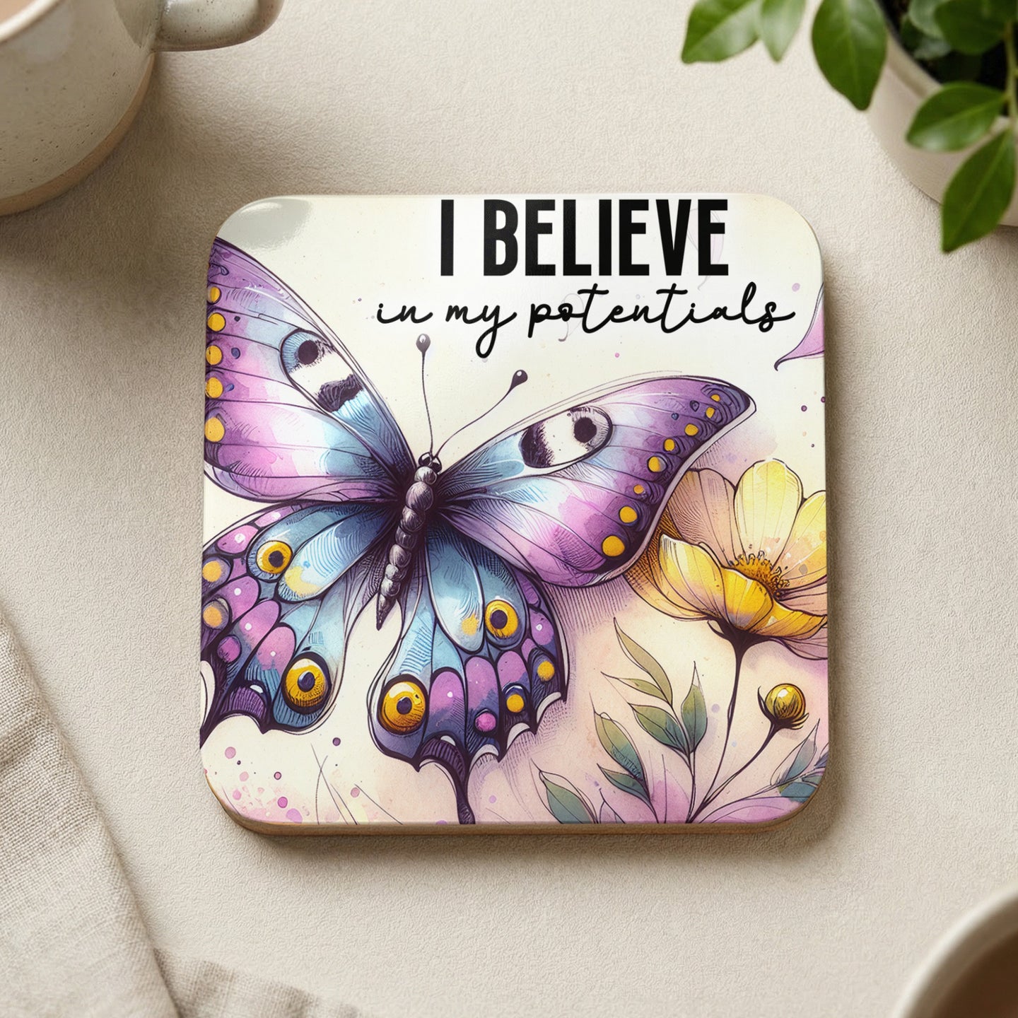 Coaster with butterfly and flowers, reads "I BELIEVE in my potentials".
