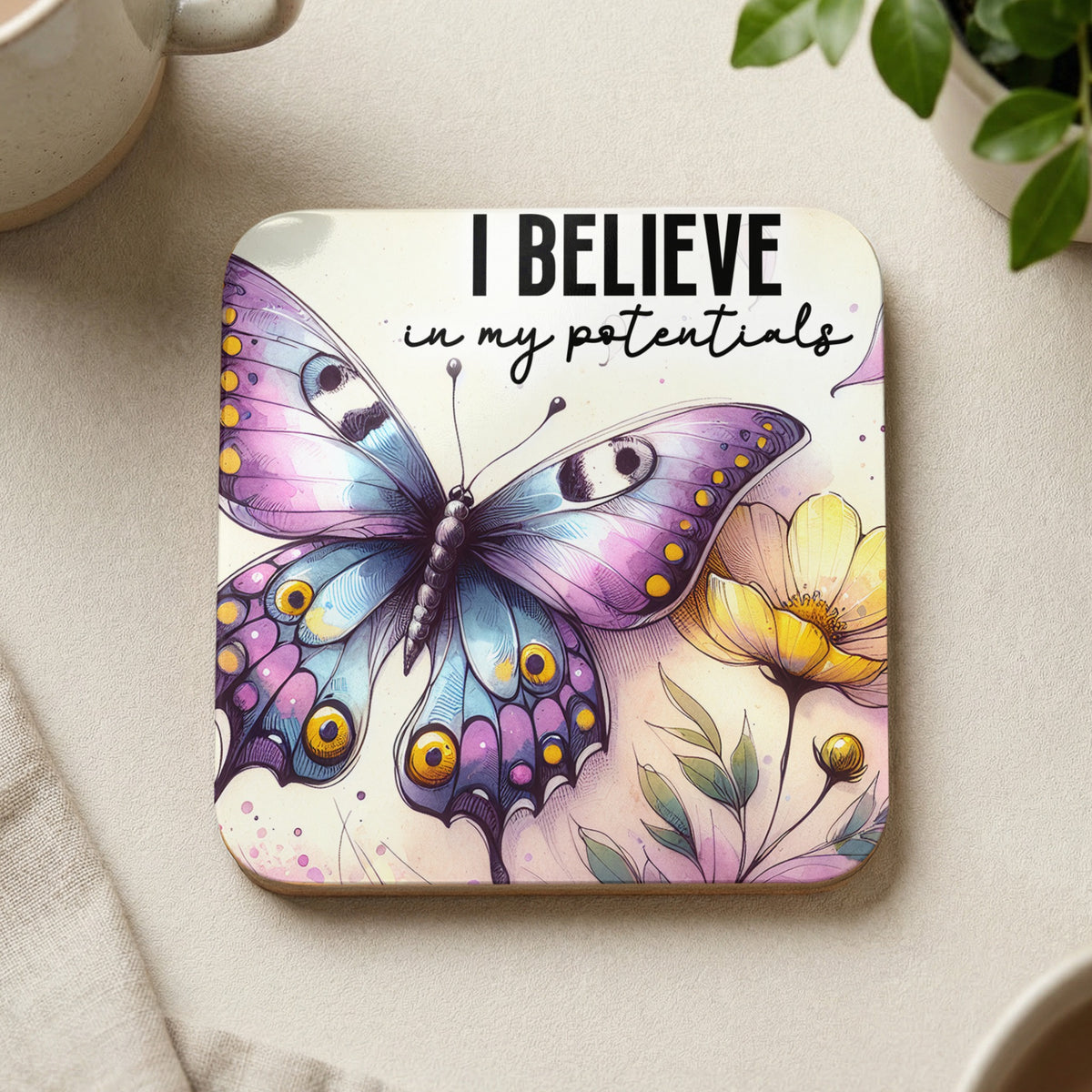 Coaster with butterfly and flowers, reads "I BELIEVE in my potentials".